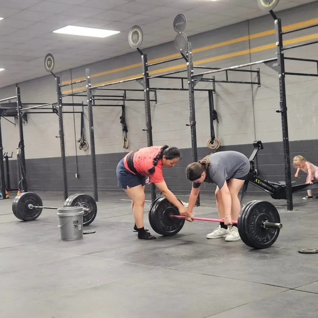 Members of Burn Pit Performance and Athletics together in the gym.